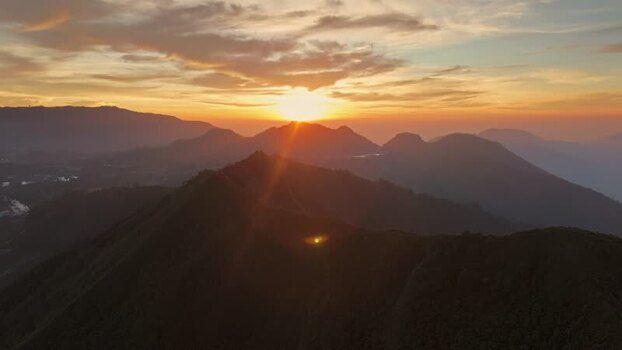 Aerial view of sunset over Dieng mountains Indonesia.