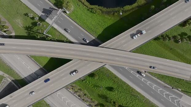 Aerial view of sawgrass interchange and traffic United States.