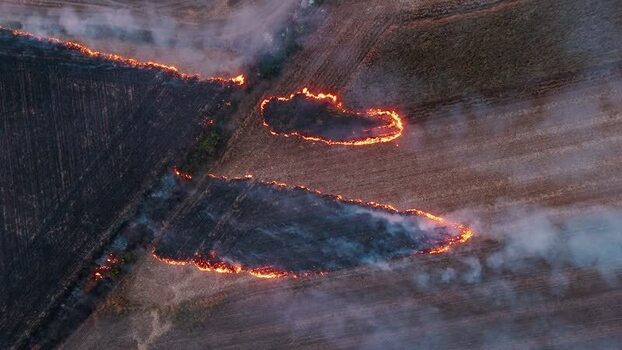 Aerial view of field fire in Sremska Mitrovica Serbia. Aerial view of field fire in Sremska Mitrovica Serbia.