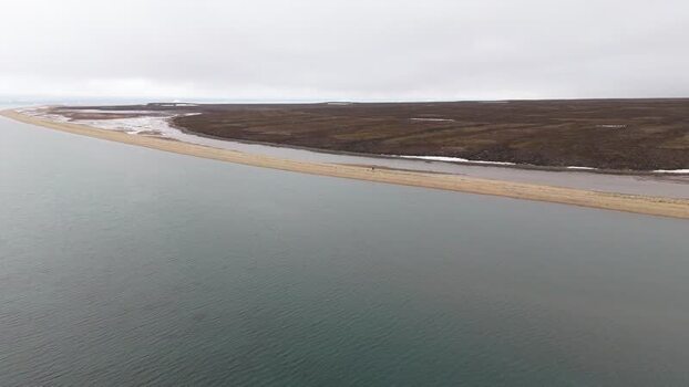 Aerial view of a sandy beach spit and tundra landscape Greenland. Aerial view of a sandy beach spit and tundra landscape Greenland.