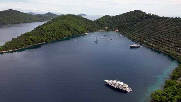 Aerial view of boats in bay with green hills Elaphiti islands Dalmatian Coast Croatia. Aerial view of boats in bay with green hills Elaphiti islands Dalmatian Coast Croatia.