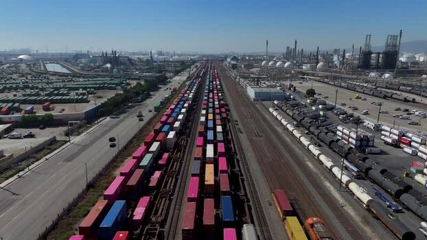 Aerial view of freight train with shipping containers United States.