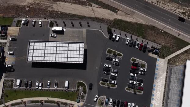 Aerial view of gas station and parking lot in United States.