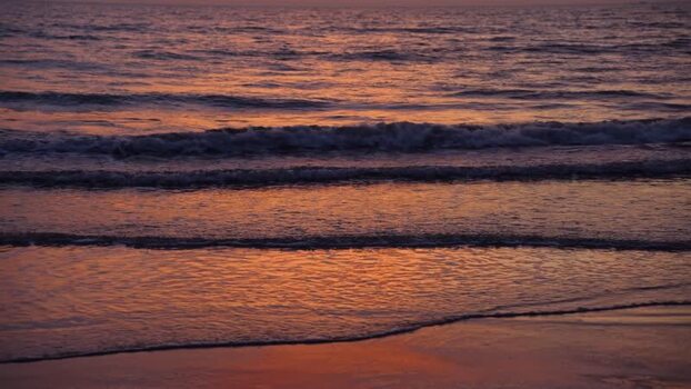 View of sunset waves rolling onto the shore Bangladesh. View of sunset waves rolling onto the shore Bangladesh.