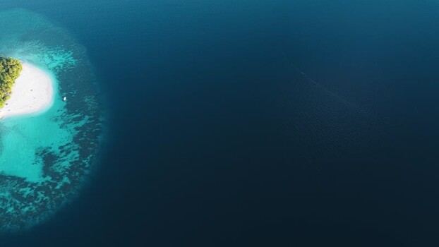 Aerial view of a tropical island and coral reef Maldives. Aerial view of a tropical island and coral reef Maldives.