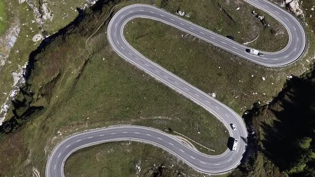 Aerial view of Julier Pass road in Surses Switzerland.