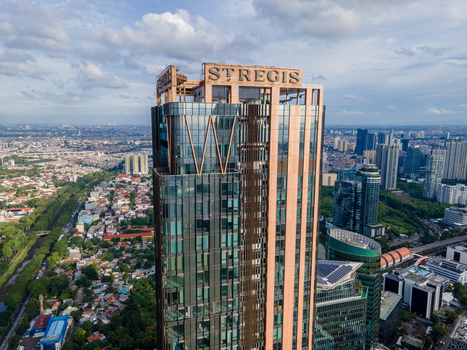 South Jakarta Indonesia 10 January 2026 Aerial view of The St. Regis Jakarta skyscraper with its modern glass facade and rooftop signage overlooking the urban skyline. South Jakarta Indonesia 10 January 2026 Aerial view of The St. Regis Jakarta skyscraper with its modern glass facade and rooftop signage overlooking the urban skyline.