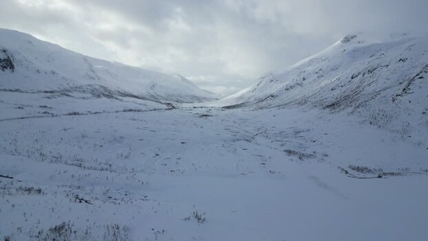 Aerial view of the snow covered Kvaloya valley in Troms Norway.