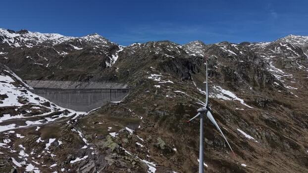 Aerial view of Lucendro Dam and wind turbine in Airolo Switzerland. Aerial view of Lucendro Dam and wind turbine in Airolo Switzerland.