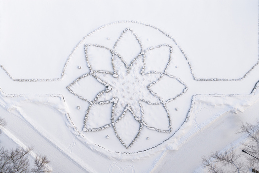 Aerial view of the flower shaped stone pattern in the snow covered garden of Traku Voke Manor in Vilnius Vilniaus apskritis Lithuania.