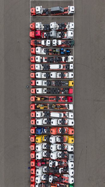 Aerial view of rows of parked trucks and transport vehicles at Ekkersrijt 2037 in Son Noord Brabant Netherlands.