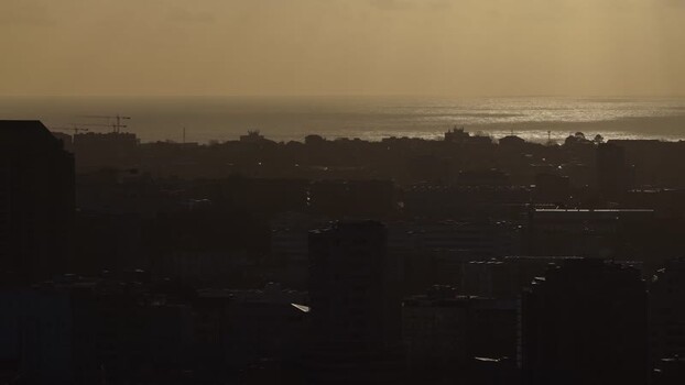 Aerial view of city buildings and ocean Portugal.
