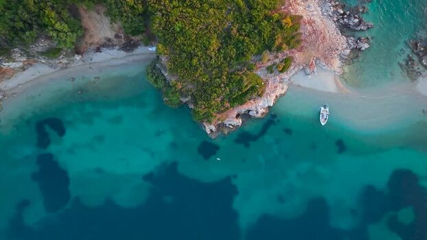 Aerial view of turquoise waters and rocky coast in Albania.