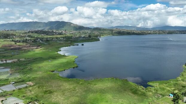 Aerial view of Alahan Panjang lake and mountains Indonesia. Aerial view of Alahan Panjang lake and mountains Indonesia.