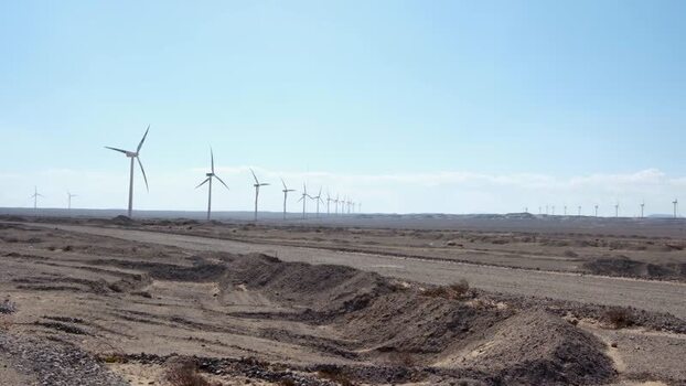View of a vast wind farm in the desert Egypt. View of a vast wind farm in the desert Egypt.