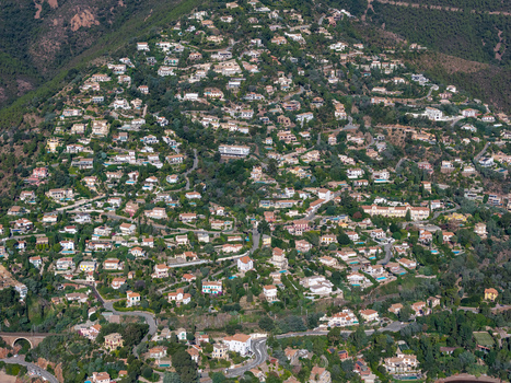 Aerial view of Le Trayas a hillside residential area with villas winding roads and lush Mediterranean vegetation in Saint Raphael Provence Alpes Cote d Azur France. Aerial view of Le Trayas a hillside residential area with villas winding roads and lush Mediterranean vegetation in Saint Raphael Provence Alpes Cote d Azur France.