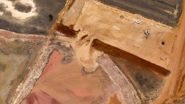 Aerial view of industrial salt mining operations showing colorful patterns of sand and mineral deposits in the landscape near Kalbarri Western Australia Australia. Aerial view of industrial salt mining operations showing colorful patterns of sand and mineral deposits in the landscape near Kalbarri Western Australia Australia.