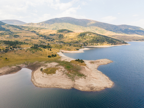 Aerial view of Belmeken Reservoir with its characteristic shoreline and surrounding hills in Pazardzhik Bulgaria. Aerial view of Belmeken Reservoir with its characteristic shoreline and surrounding hills in Pazardzhik Bulgaria.