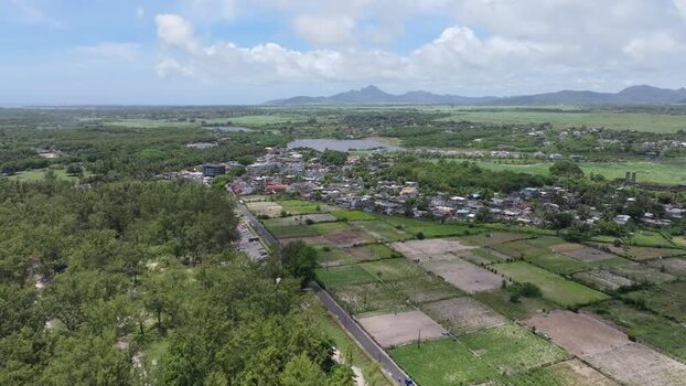 Aerial view of Belle Mare Beach and coastal town Mauritius.