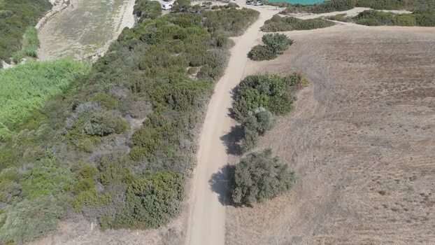 Aerial view of dirt road through rural landscape Northern Cyprus.
