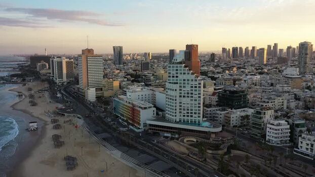 Aerial view of city buildings at sunset Israel.