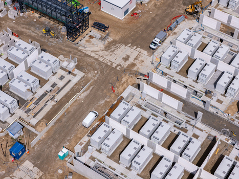 Aerial view of the Zarnowiec Pumped Storage Power Station construction site with battery storage containers modular units and vehicles Wejherowo County Pomeranian Voivodeship Poland.