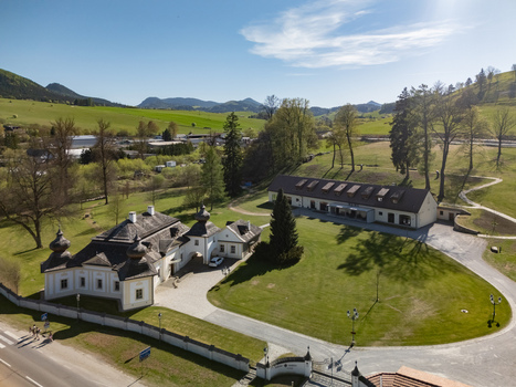 Aerial view of Kastiel Kubinyi manor house with its historic architecture manicured green lawn and surrounding rolling hills in Vysny Kubin Zilinsky kraj Slovakia. Aerial view of Kastiel Kubinyi manor house with its historic architecture manicured green lawn and surrounding rolling hills in Vysny Kubin Zilinsky kraj Slovakia.