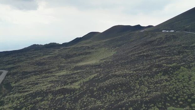 Aerial view of Mount Etna volcanic slopes and dark soil Italy. Aerial view of Mount Etna volcanic slopes and dark soil Italy.