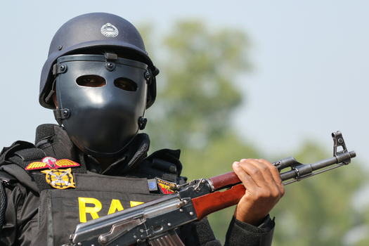 Dhaka Bangladesh 08 January 2017 View of a member of the Rapid Action Battalion RAB in full tactical gear holding an assault rifle at the RAB Headquarters. Dhaka Bangladesh 08 January 2017 View of a member of the Rapid Action Battalion RAB in full tactical gear holding an assault rifle at the RAB Headquarters.