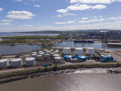 Grangemouth United Kingdom 06 May 2026 Aerial view of Grangemouth refinery and port facilities with large oil storage tanks shipping containers and industrial infrastructure. Grangemouth United Kingdom 06 May 2026 Aerial view of Grangemouth refinery and port facilities with large oil storage tanks shipping containers and industrial infrastructure.