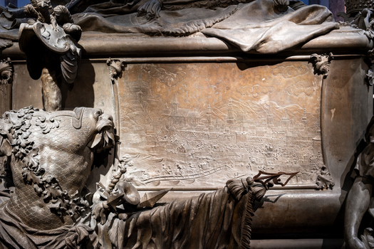 Vienna Austria 25 April 2026 View of the ornate bronze sarcophagus in the Imperial Crypt featuring a detailed relief of a city and decorative armor elements. Vienna Austria 25 April 2026 View of the ornate bronze sarcophagus in the Imperial Crypt featuring a detailed relief of a city and decorative armor elements.