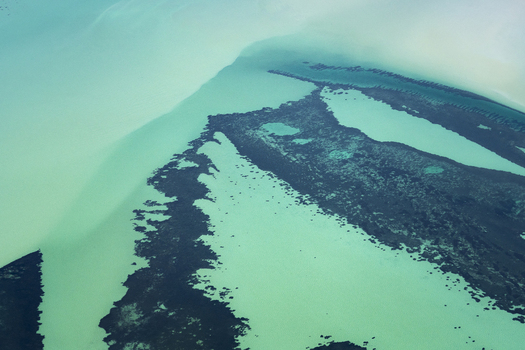 Aerial view of the turquoise waters and intricate sandbanks of the coastline in the Shire of Shark Bay Western Australia Australia. Aerial view of the turquoise waters and intricate sandbanks of the coastline in the Shire of Shark Bay Western Australia Australia.