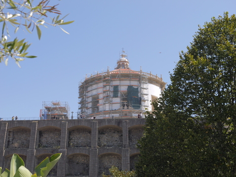View of Mosteiro da Serra do Pilar undergoing restoration with scaffolding against a clear blue sky in Porto Porto District Portugal. View of Mosteiro da Serra do Pilar undergoing restoration with scaffolding against a clear blue sky in Porto Porto District Portugal.
