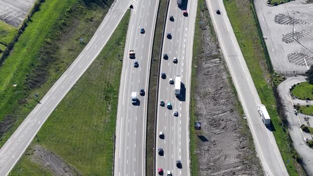 Aerial view of highway interchange with vehicles France.