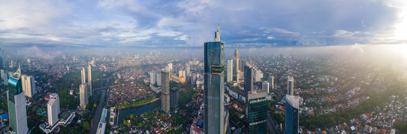South Jakarta Indonesia 10 January 2026 Aerial view of the modern skyline of South Jakarta featuring the Gama Tower and dense urban sprawl under a dramatic cloudy sky with sunlight. South Jakarta Indonesia 10 January 2026 Aerial view of the modern skyline of South Jakarta featuring the Gama Tower and dense urban sprawl under a dramatic cloudy sky with sunlight.