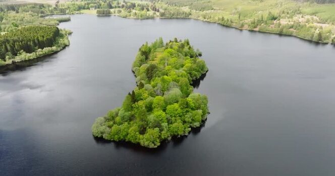 Aerial view of a lush green island in Findhorn United Kingdom. Aerial view of a lush green island in Findhorn United Kingdom.