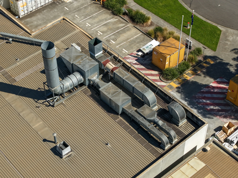 Kilsyth Victoria Australia 20 September 2026 Aerial view of industrial ventilation systems and ductwork on a corrugated metal roof of a factory in Kilsyth Victoria Australia. Kilsyth Victoria Australia 20 September 2026 Aerial view of industrial ventilation systems and ductwork on a corrugated metal roof of a factory in Kilsyth Victoria Australia.