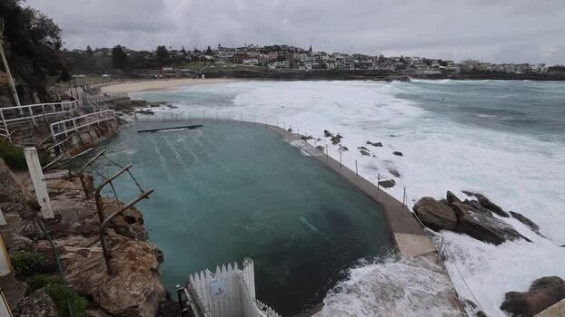 View of Bondi Icebergs pool and crashing waves in Australia.