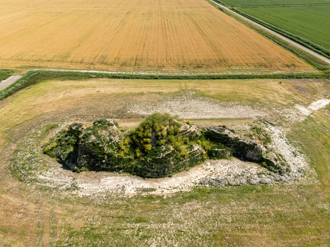 Aerial view of the Dijk van een wijf earthwork sculpture surrounded by agricultural fields in Oosterbierum Friesland Netherlands. Aerial view of the Dijk van een wijf earthwork sculpture surrounded by agricultural fields in Oosterbierum Friesland Netherlands.