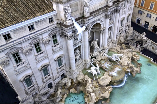 Rome Italy 28 June 2024 Aerial view of Trevi Fountain with its intricate baroque sculptures turquoise water and surrounding historic buildings in the city. Rome Italy 28 June 2024 Aerial view of Trevi Fountain with its intricate baroque sculptures turquoise water and surrounding historic buildings in the city.