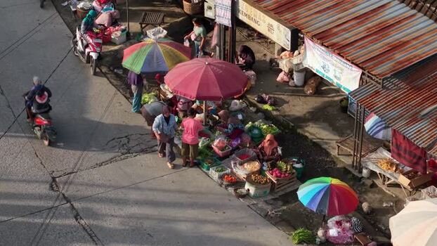 Aerial view of a street market with colorful umbrellas Indonesia. Aerial view of a street market with colorful umbrellas Indonesia.