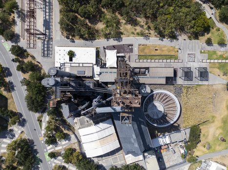 Aerial view of the historic industrial structures at Fundidora Park featuring the iconic blast furnace surrounding walkways and lush green spaces in Monterrey Nuevo Leon Mexico. Aerial view of the historic industrial structures at Fundidora Park featuring the iconic blast furnace surrounding walkways and lush green spaces in Monterrey Nuevo Leon Mexico.