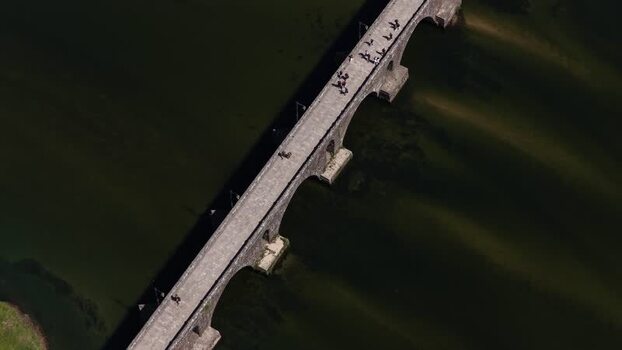 Aerial view of the roman bridge in Ponte de Lima with tourists Portugal. Aerial view of the roman bridge in Ponte de Lima with tourists Portugal.