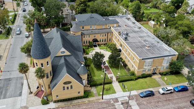 Aerial view of Ancient City Baptist Church with its distinctive tower and surrounding historic buildings lush greenery and street views in St. Augustine Florida United States. Aerial view of Ancient City Baptist Church with its distinctive tower and surrounding historic buildings lush greenery and street views in St. Augustine Florida United States.