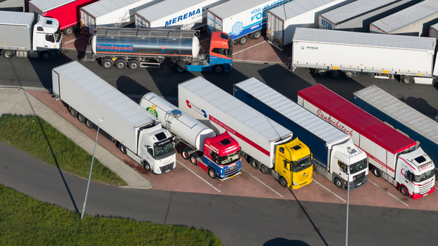 Bant Netherlands 23 April 2026 Aerial view of various semi trucks and trailers parked in a designated rest area or logistics hub under bright daylight. Bant Netherlands 23 April 2026 Aerial view of various semi trucks and trailers parked in a designated rest area or logistics hub under bright daylight.