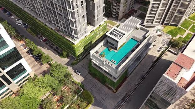 Aerial view of residential community with swimming pool India. Aerial view of residential community with swimming pool India.