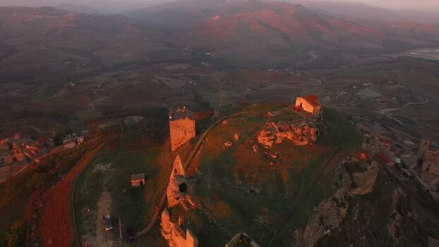 Aerial view of historic castle ruins in Sicily Italy.
