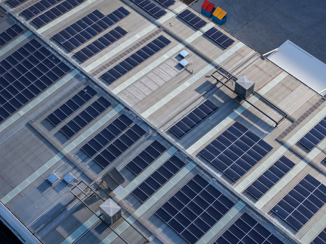 Aerial view of solar panels installed on the roof of a factory in Kilsyth South Melbourne VIC Australia. Aerial view of solar panels installed on the roof of a factory in Kilsyth South Melbourne VIC Australia.