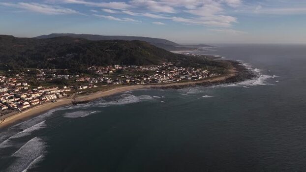 Aerial view of coastal houses and beach in Moledo Portugal. Aerial view of coastal houses and beach in Moledo Portugal.