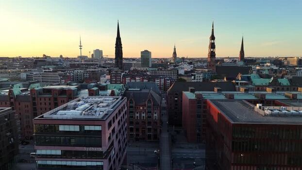 Aerial view of Speicherstadt and city skyline at sunset in Hamburg Germany. Aerial view of Speicherstadt and city skyline at sunset in Hamburg Germany.